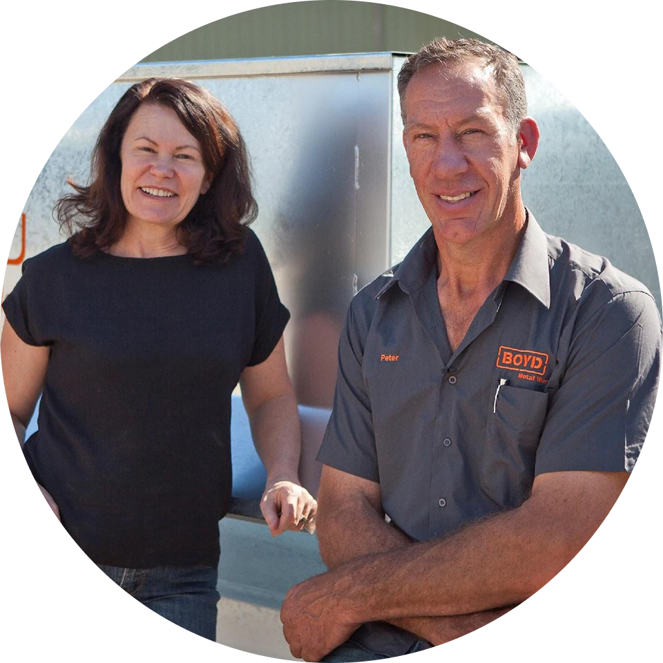 Peter and Ann-Maree Boyd standing together at the Boyd Metal Works workshop